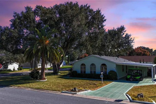 1202 Del Toro Dr, The Villages, front elevation at dusk