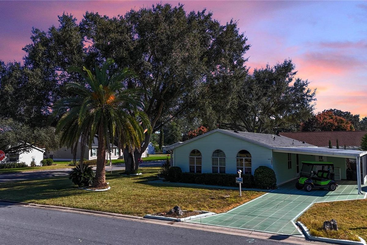 1202 Del Toro Dr, The Villages - front elevation at dusk